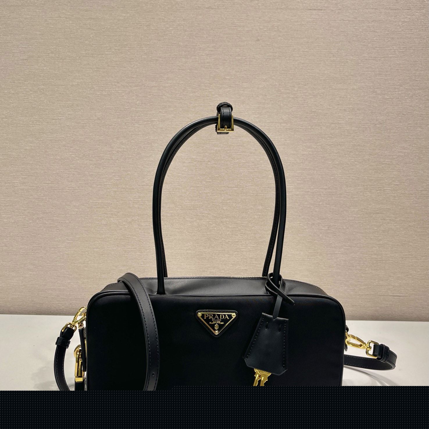 Pra*a top handle bags